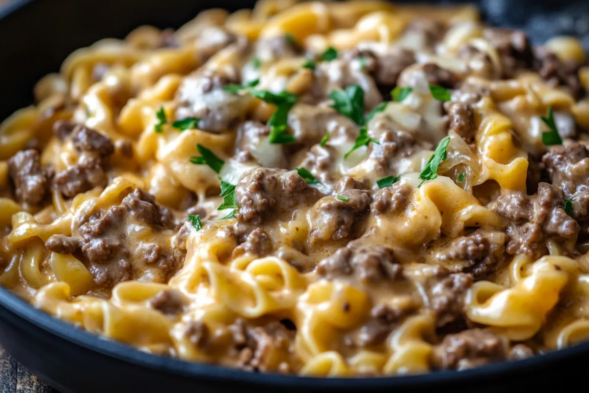 A serving of creamy Hamburger Helper Beef Stroganoff with pasta and ground beef on a plate, perfect for a quick dinner.