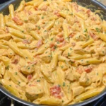 Cheesy Queso Chicken Penne Skillet