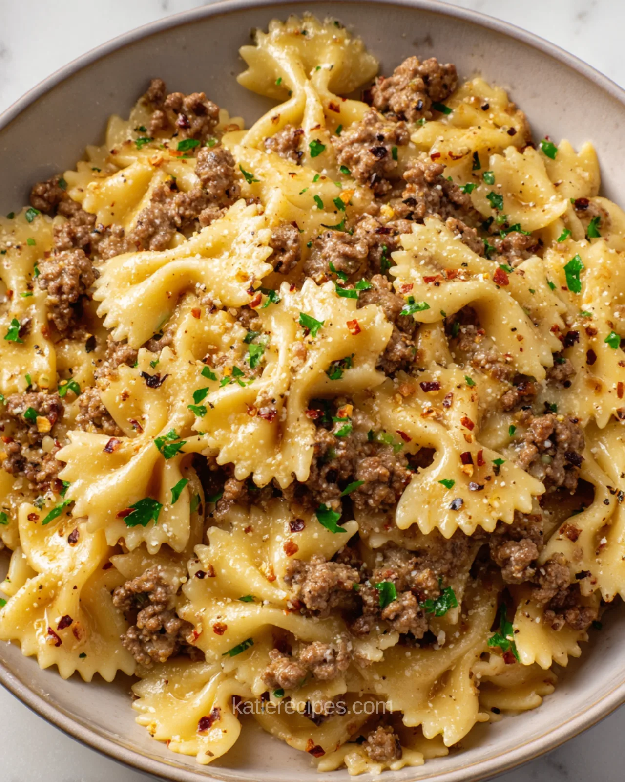 Farfalle pasta with ground beef garlic butter sauce