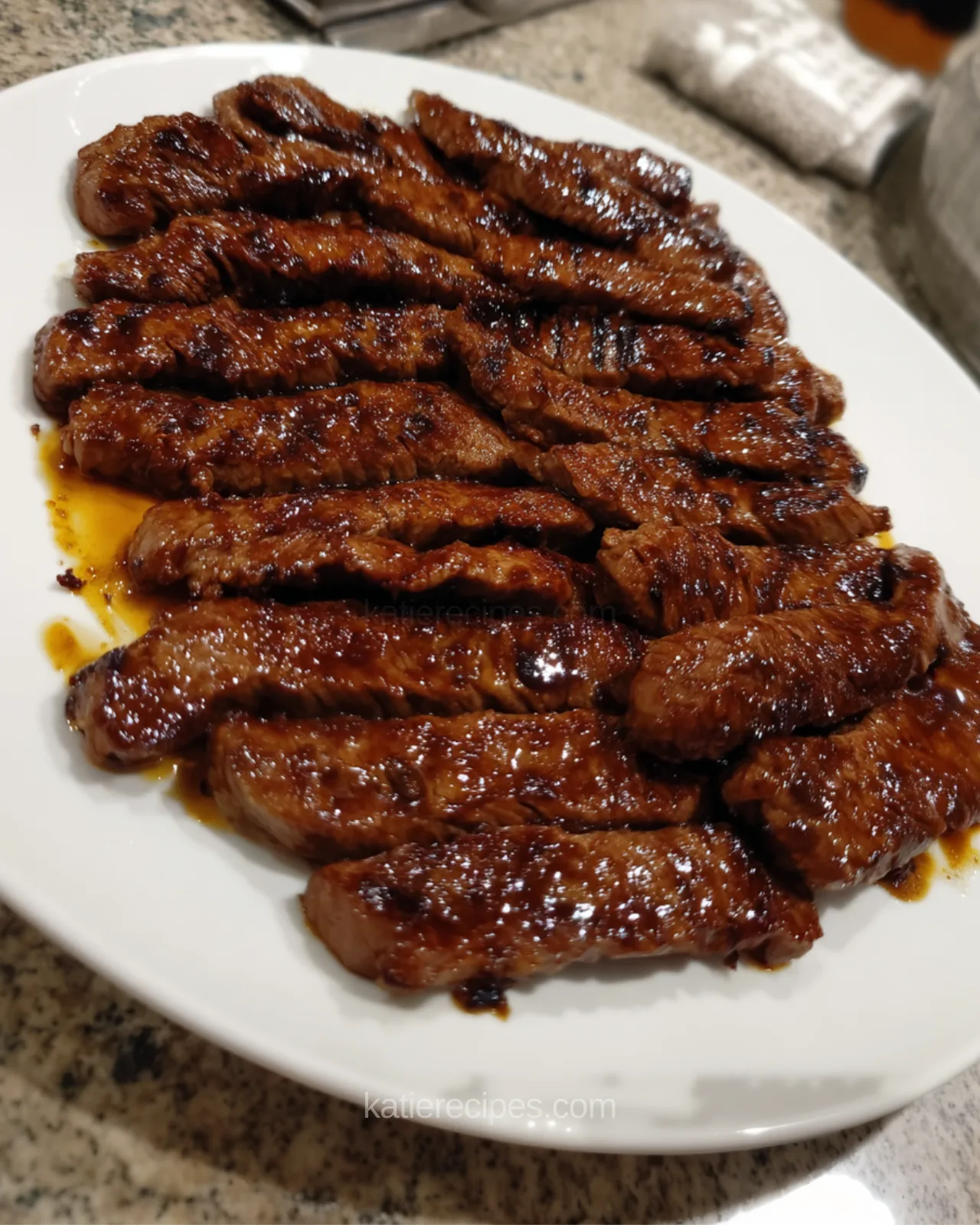 honey glazed steak strips on grill pan