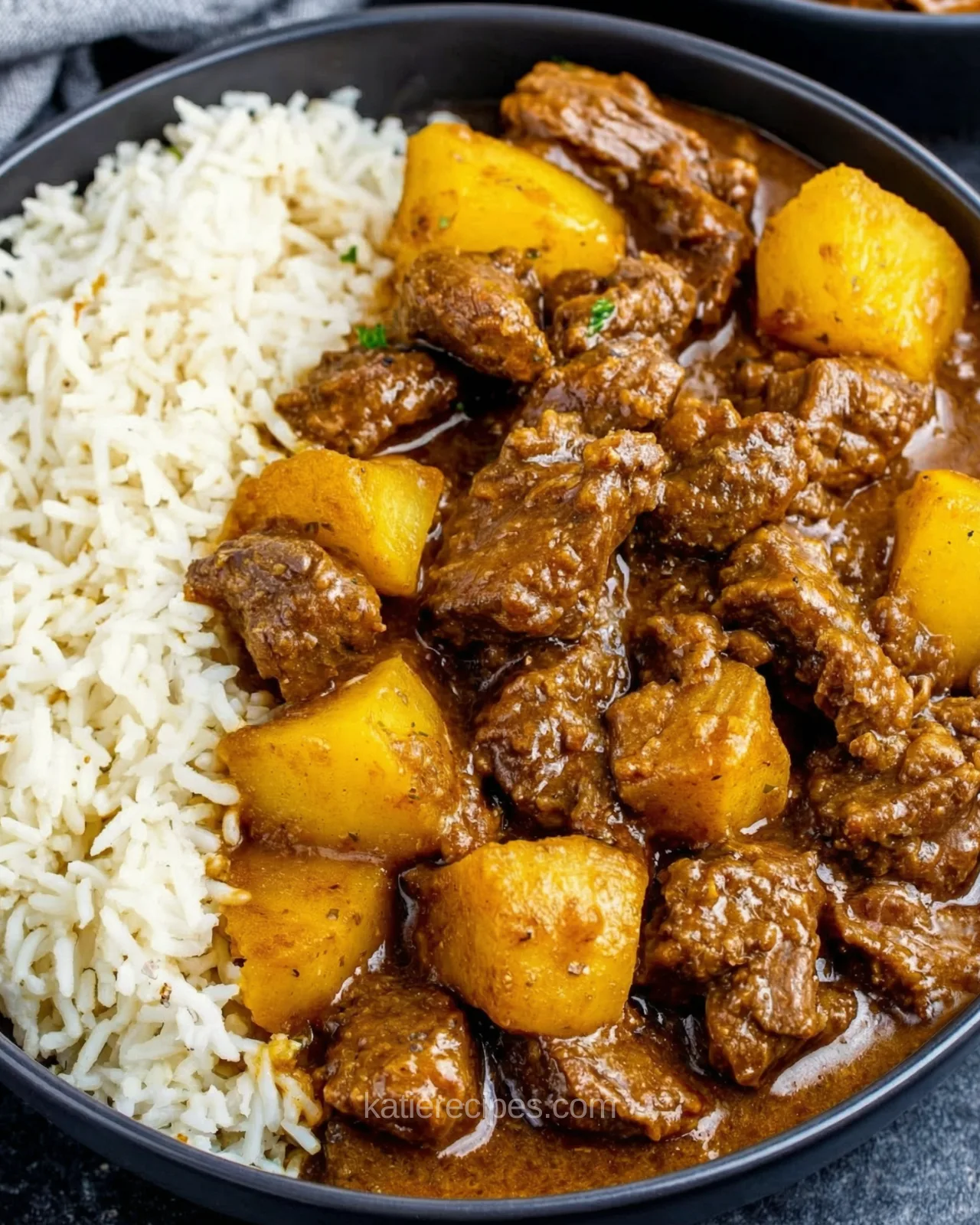 Jamaican curry beef with potatoes in bowl