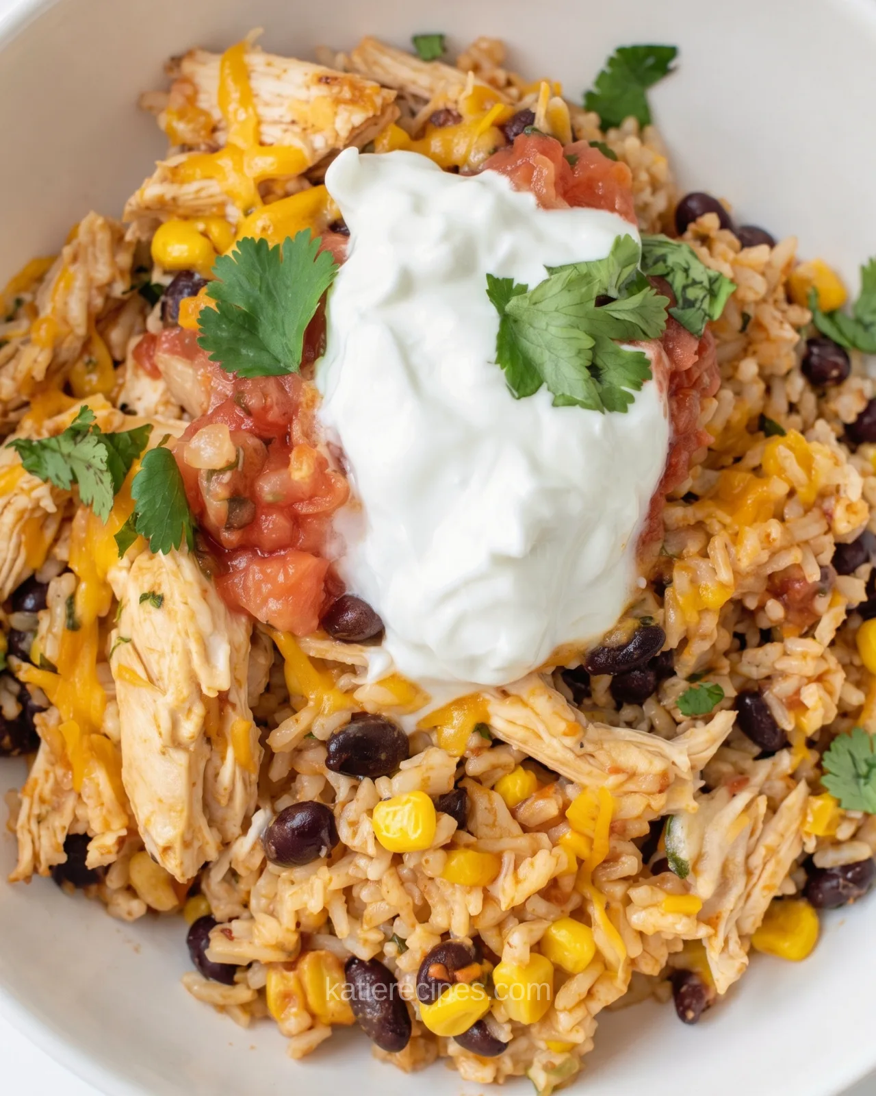  chicken burrito bowl bake topped with sour cream